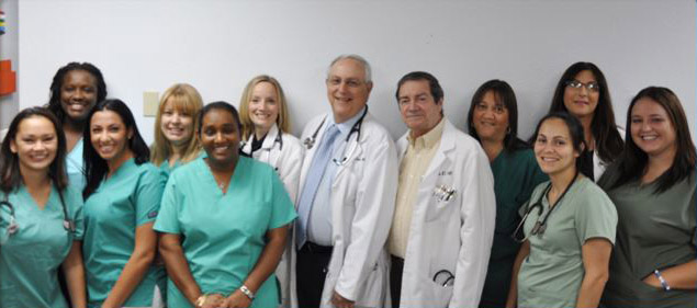 Drs Kahn and Riskin with staff